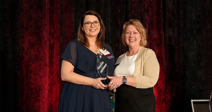 Holly receiving the WICPA Community Service Award